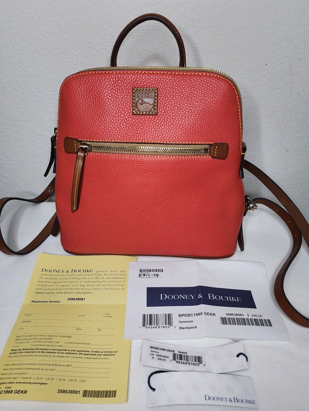 New Dooney & Bourke Small Pebble Leather Backpack in Coral Color